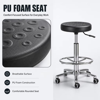 Tabouret rond réglable en PU, tabouret de travail industriel 360° °   Siège pivotant réglable en hauteur avec repose-pieds et roulettes SY-535