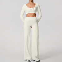 Ensemble de sport pour femmes, doux, pour la course et le fitness, comprenant un haut court à manches longues et dos ouvert et un pantalon taille haute à jambe large effet galbant fessier, idéal pour la gym