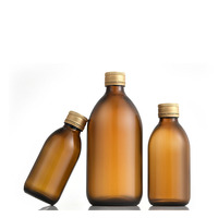 Vente en gros de sirop contre la toux rond ambré vide de 200ml 300ml 500ml bouteille en verre liquide orale avec bouchon en aluminium pour sirop liquide de médecine