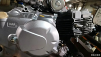 Moteur de moto automatique 110cc avec marche arrière, refroidissement par air, quatre temps, démarrage électrique.