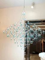 Lustre moderne en cristal K9 pour villa duplex, design ciel étoilé et lucioles, idéal pour salon à plafond haut, éclairage artistique de luxe français en cristal