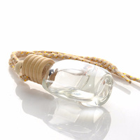Vente en gros 10ml bouteille de diffuseur d'aromathérapie en verre suspendu pour voiture contenant de parfum pendentif vide rechargeable avec bouchon à vis en bois