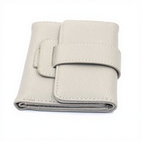 Nouveau style, portefeuille portable en PU, petit et tendance, unisexe, court, style japonais/coréen, mignon, avec pompon, mini pochette à boucle