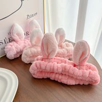 Serre-tête élastique en flanelle douce antidérapant avec oreilles de lapin pour femme, idéal pour le lavage du visage, vente en gros, style européen et américain