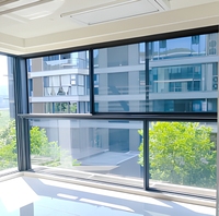 Fenêtre coulissante à double battant en aluminium à rupture de pont thermique, double vitrage en verre trempé, offre une isolation améliorée, étanche à l'eau et à l'humidité