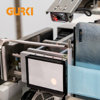 Machine d'étiquetage et de scellage de cartons entièrement automatique électrique GURKI GPETB3530-A pour l'emballage des boissons