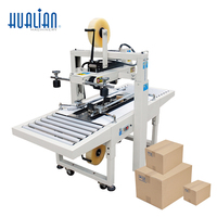 FXJ-6050 Hualian Scelleuse de cartons électrique automatique à grande vitesse, réglable, pour scellage par le haut et par le bas, stable et performante