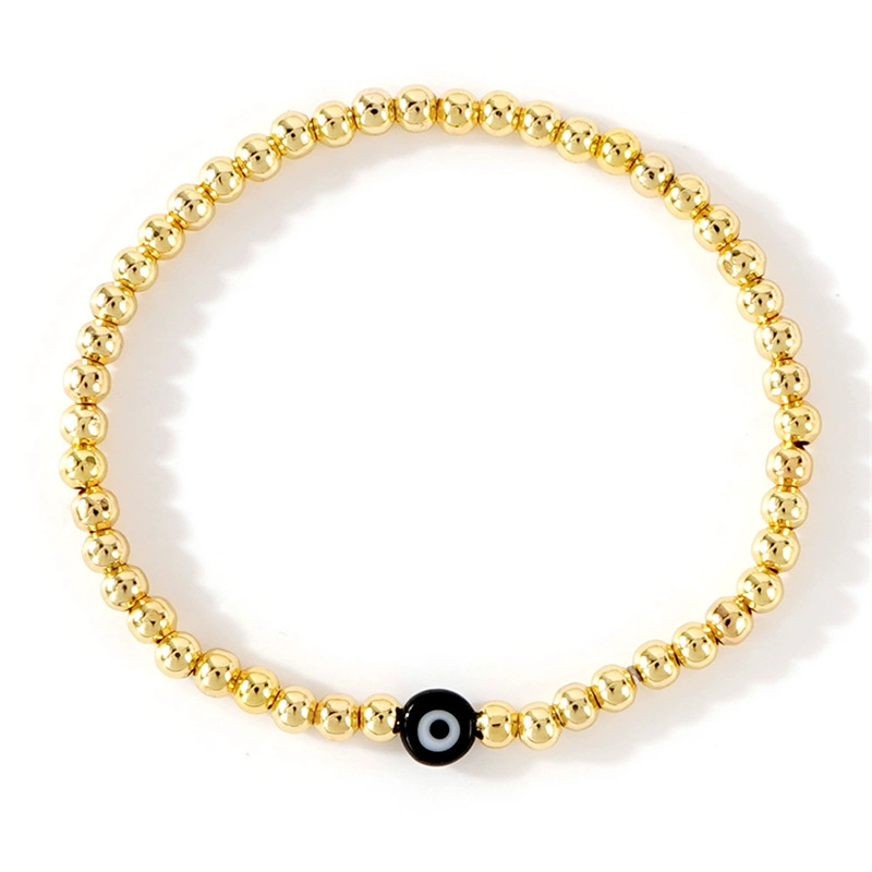 Golden beaded Black Devils Eye (No card)