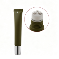 Tube cosmétique vide vert olive avec bouchon argenté et applicateur de massage à 3 billes métalliques pour crème contour des yeux
