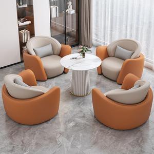 Ensemble de canapés de réception ronds en cuir, style minimaliste moderne, avec une table et quatre chaises rembourrées en éponge, pour usage commercial et de bureau - Product Image 2