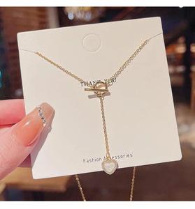 שרשרת אופנה עם שיבוץ יהלומים בצורת לב ותליון צדף. שרשרת לנשים OT - Product Image 1