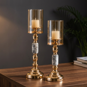 Juego de 2 candelabros de metal dorado de diseño lujoso con tapa de vidrio, ideal para recepción y decoración del hogar - Product Image 1