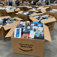 Boîte mystère d'inventaire de surplus électronique : Téléphones portables, ordinateurs portables, projecteurs, bagues connectées, chargeurs pour acheteurs exportateurs, stock en gros