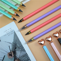 Crayon infini en métal sans encre de luxe, modèle Heart Top Eternal, pour l'école, le bureau, les fournitures scolaires, cadeau