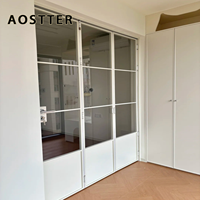 Puerta Plegable de Aluminio Extruido AOSTTER en Blanco Limpio con Doble Acristalamiento Low-E IGU y Diseño Anti-Pinch para Apartamentos de Lujo