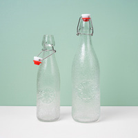 Bouteille en verre ronde transparente de 1L avec bouchon basculant pour brassage artisanal et stockage de bière à domicile – Vente en gros