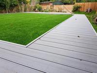 Planches de terrasse en composite imperméables et antidérapantes OEM/ODM, résistantes aux UV, pour terrasses de jardin, revêtement de sol en WPC, grain de bois