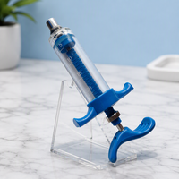 Seringues automatiques en plastique et acier TPX de 10 ml et 20 ml pour l'injection vétérinaire, adaptées aux bovins, ovins, porcins et volailles.