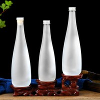 Bouteilles en verre vides de 330ml 500ml pour boissons alcoolisées boissons gazeuses bouteille de vin en verre d'eau minérale française evian pour boisson
