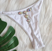 Xuanlang Stock 3 couleurs Matière holographique brillante String de bain effet diamant Maillot de bain G-string Vente en gros