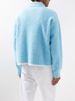 Usine fabricant de tricots logo personnalisé Designer fausse fourrure hommes brossé mohair fourrure moelleux pull polo en tricot