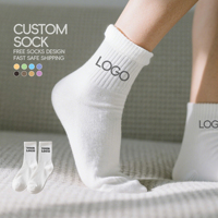 Chaussettes blanches en coton avec logo de créateur Vente en gros Chaussettes d'emballage unisexes de haute qualité Chaussettes de sport personnalisées/conception gratuite