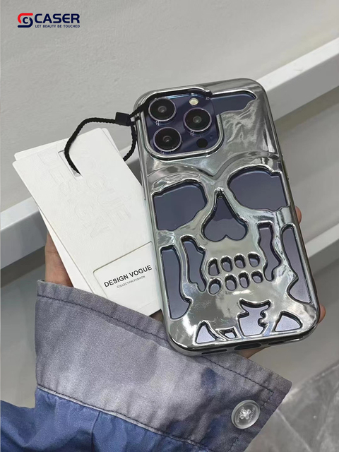 2026 Creativity Hollow Out Skull Design Unique Popular Electroplated Heat Dissipation Phone Case for iPhone 17/16/15