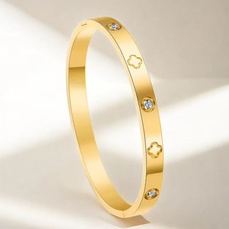 Oro: braccialetto quadrifoglio con 3 diamanti
