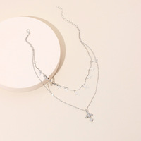 Collier ras du cou rétro multicouche avec pendentif croix, style influenceur, vente en gros