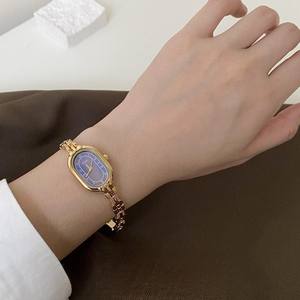 นาฬิกาข้อมือสไตล์เรโทรสุดหรูสำหรับผู้หญิง ดีไซน์แผ่นหน้าปัดแบบศิลปะ สายบาง ดีไซน์เรียบหรู เหมาะสำหรับนักเรียน คุณภาพสูง กันน้ำ - Product Image 1