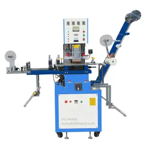 Elastic tape embossing machine with tape feeding and tape receiving system