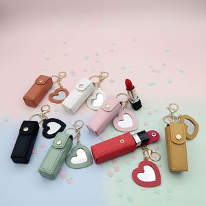 Estuche protector de lápiz labial portátil con espejo en forma de corazón, superventas transfronterizo, bonito y sencillo, con colgante para llavero, ideal para cumpleaños y fiestas. - Product Image 1