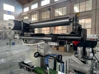 Machine d'enroulement de profilés PUR pour MDF et profilés en aluminium, film PVC et placage bois avec système de préchauffage sur trois côtés