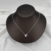 Accessoires de mode, collier en alliage romantique avec pendentif en forme de nœud, imitation perle, bijoux classiques pour femmes