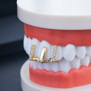 Ensemble de trois grillz dorés pour les dents, bijoux de fête avec incrustation de zircon - Product Image 1
