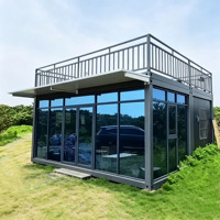 Maison conteneur préfabriquée de 20 pieds avec terrasse sur le toit et auvent, mur-rideau entièrement vitré moderne, bureau modulaire préfabriqué, cabine de loisirs