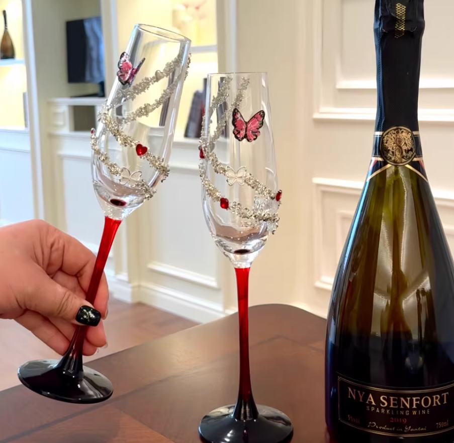 2 Red butterfly champagne glasses