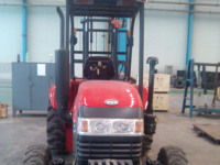 Chariot à palettes tout-terrain monté sur tracteur de marque chinoise TC4015, moteur diesel, capacité de charge de 1500 kg, pour usage commercial