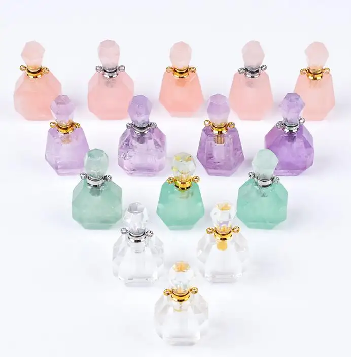 wholesale custom design natural rock crystal stone hand carved empty perfume bottle