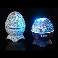 Projecteur d'étoiles œuf de dinosaure avec haut-parleur Bluetooth, veilleuse vague océanique et ciel galactique pour la décoration de chambre d'enfants et d'adultes