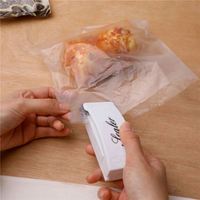 Machine de scellage alimentaire portable à main, mini-scelleuse sous vide à faible bruit pour sacs en plastique, alimentée par piles, pour usage domestique - Vente en gros