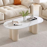Meubles en pierre design moderne Décoration intérieure table ovale en pierre naturelle beige table à manger en marbre travertin à base cannelée