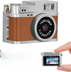 Mini caméra numérique avec zoom optique 1080P avec écran de 0,96 pouces et porte-clés rétro OTG pour les voyages, les études, les concerts - Product Image 1