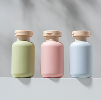 Bouteille de lotion corporelle à ouverture par pression personnalisée, pour séparer le liquide en deux parties plus petites, pour le shampoing et le gel douche.