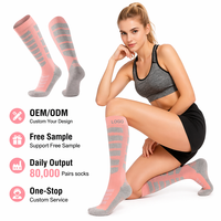 Chaussettes de ski et de snowboard pour jeunes, personnalisées, à compression, hauteur genou, thermiques, écologiques, respirantes, en laine mérinos, semelle coussinée, logo sur le dessus