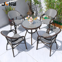 Chaise de restaurant d'extérieur moderne empilable et imperméable en rotin, table à café en aluminium et chaise de salle à manger en osier – Vente directe usine