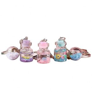 Porte-clés liquide en acrylique avec sable mouvant pour femme, pendentif de sac créatif et mignon pour couple, porte-clés flottant, cadeau - Product Image 6