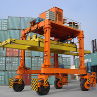 Grue à portique mobile robuste pour les opérations de conteneurs avec une capacité de levage de 20 à 40 tonnes, entraînement par moteur et moteur