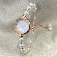 Montre à Quartz de luxe légère pour femme petit cadran en verre réglable nouveau Bracelet de perles Style transfrontalier