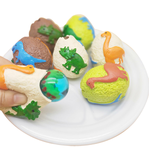 Nuevo Juguete Sensorial Antiestrés de Dinosaurio en Forma de Huevo con Pelota Antiestrés de Goma en Forma de Perro para Niños - Product Image 1